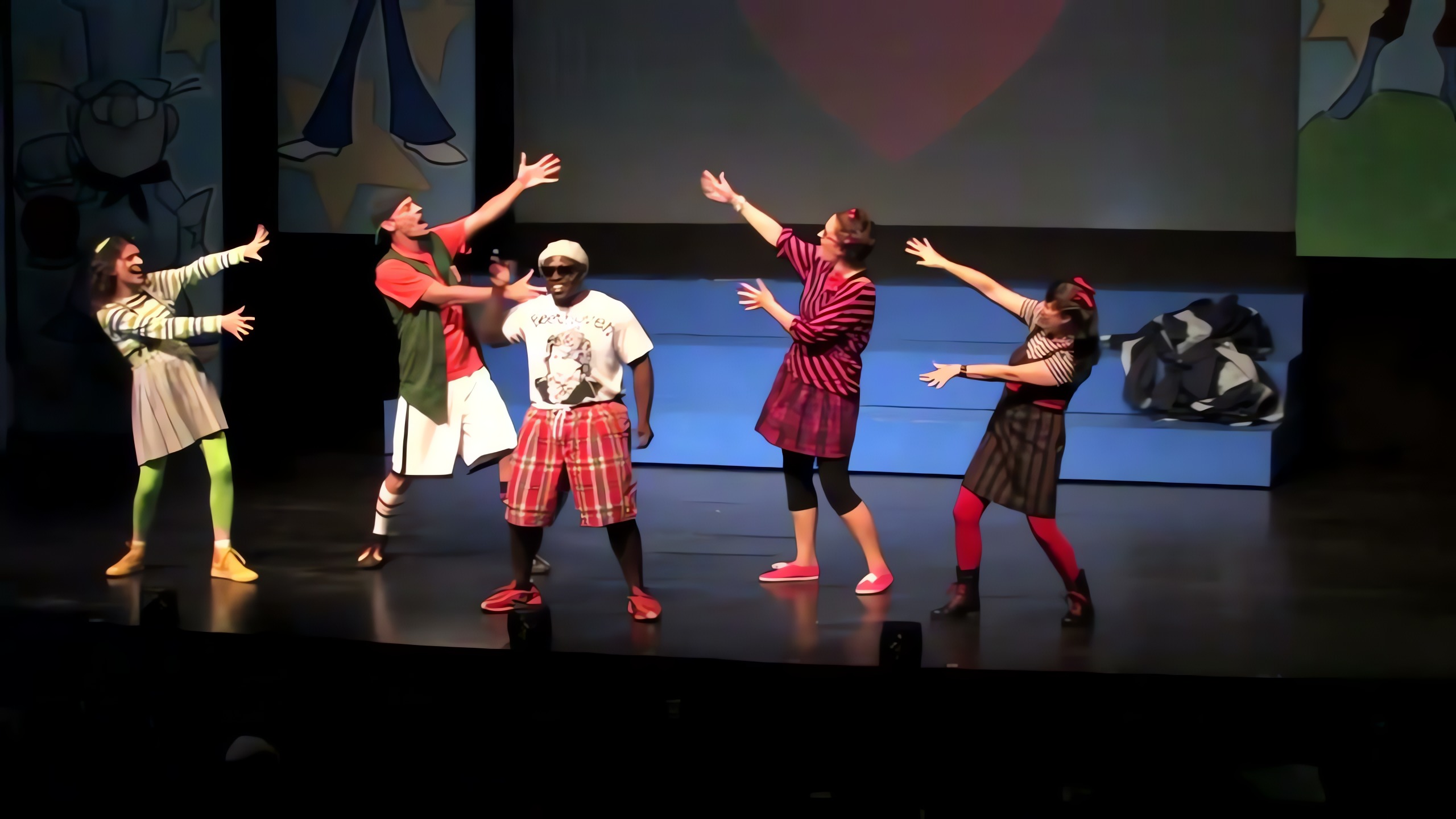 Dylan Collins with the ensemble in Magik Theatre's Schoolhouse Rock.